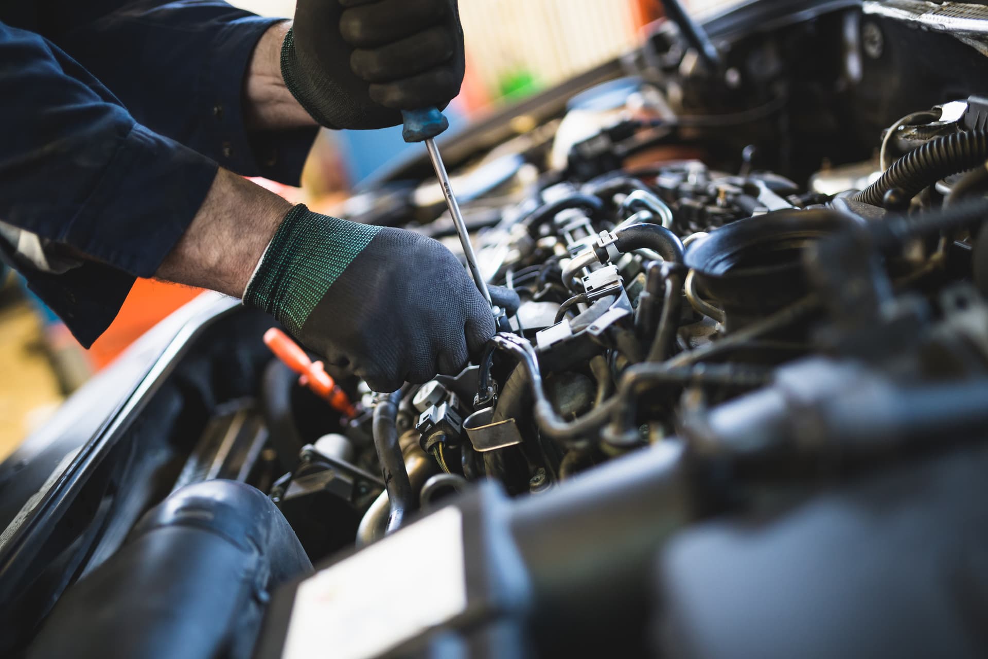 Mechanic working on car