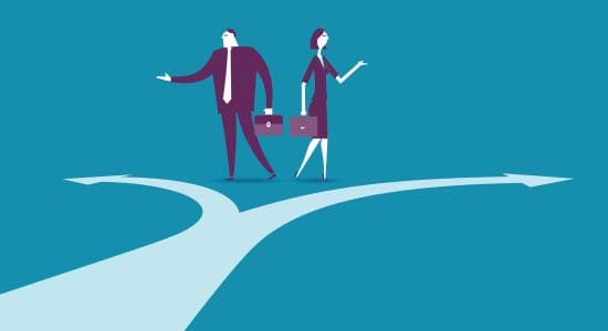 Two people at a fork in the road