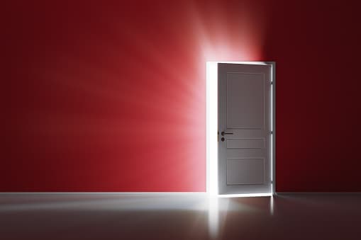 open door with light streaming through