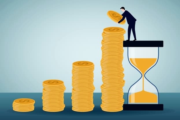 Illustration of a man stacking up gold coins beside an hourglass