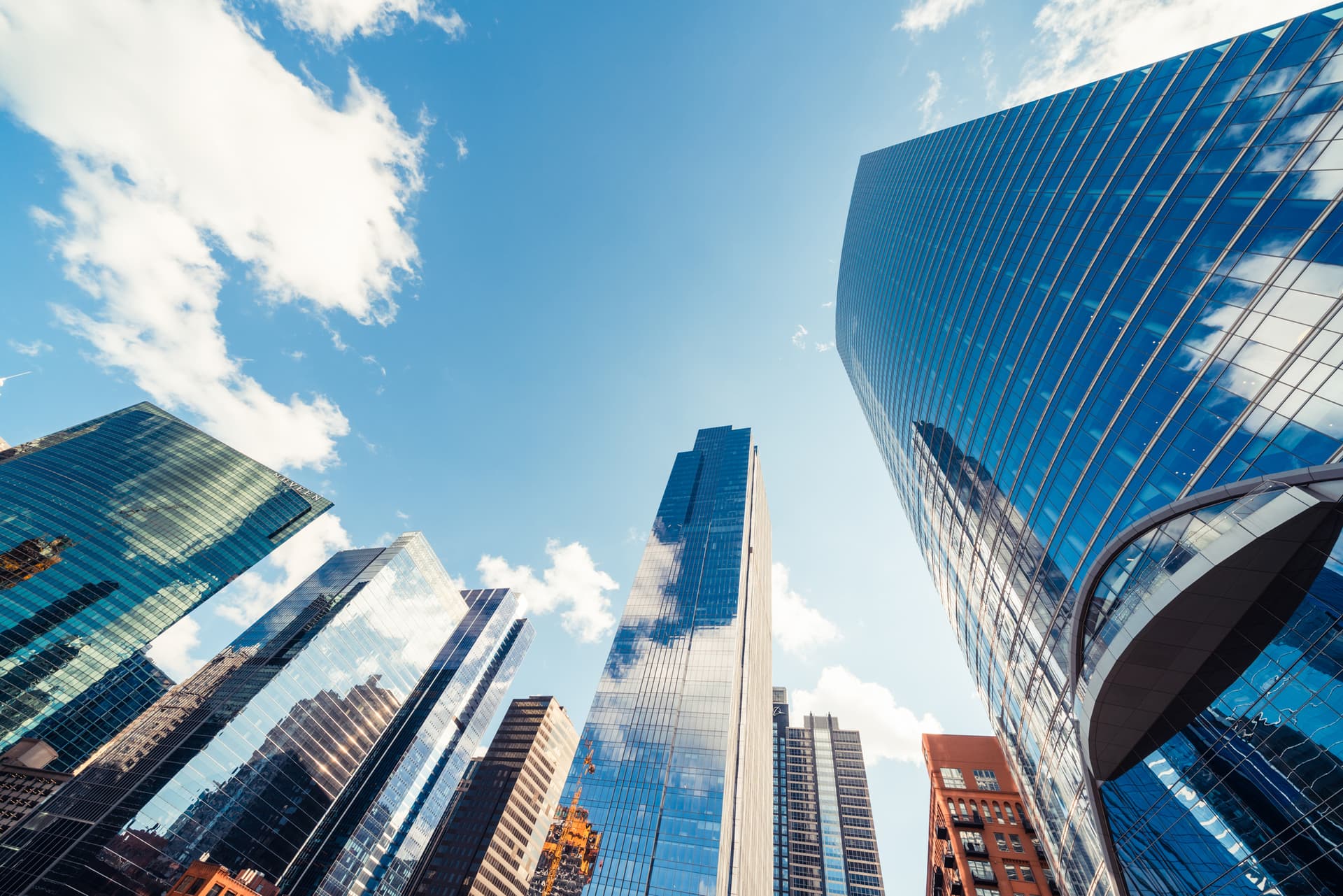 Shot of looking up at sky with skyscrapers in financial district of Chicago