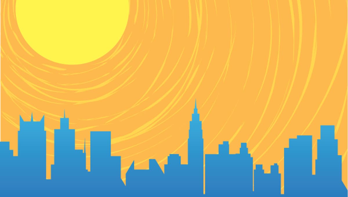 sun on city skyline
