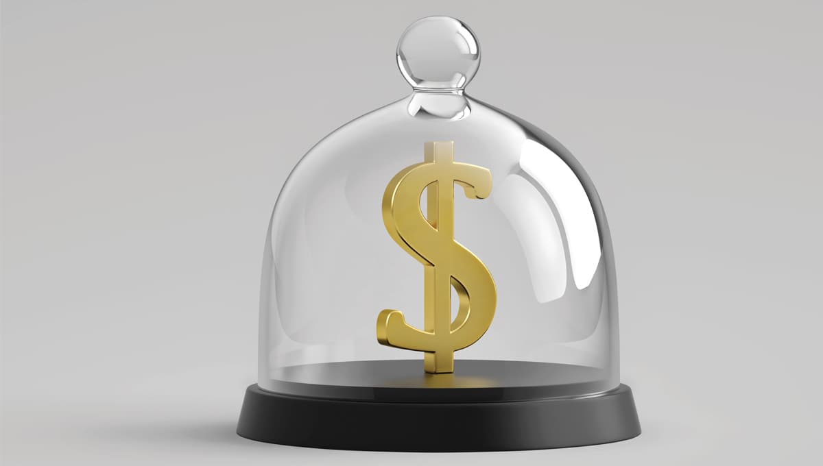 Dollar sign under a glass cloche