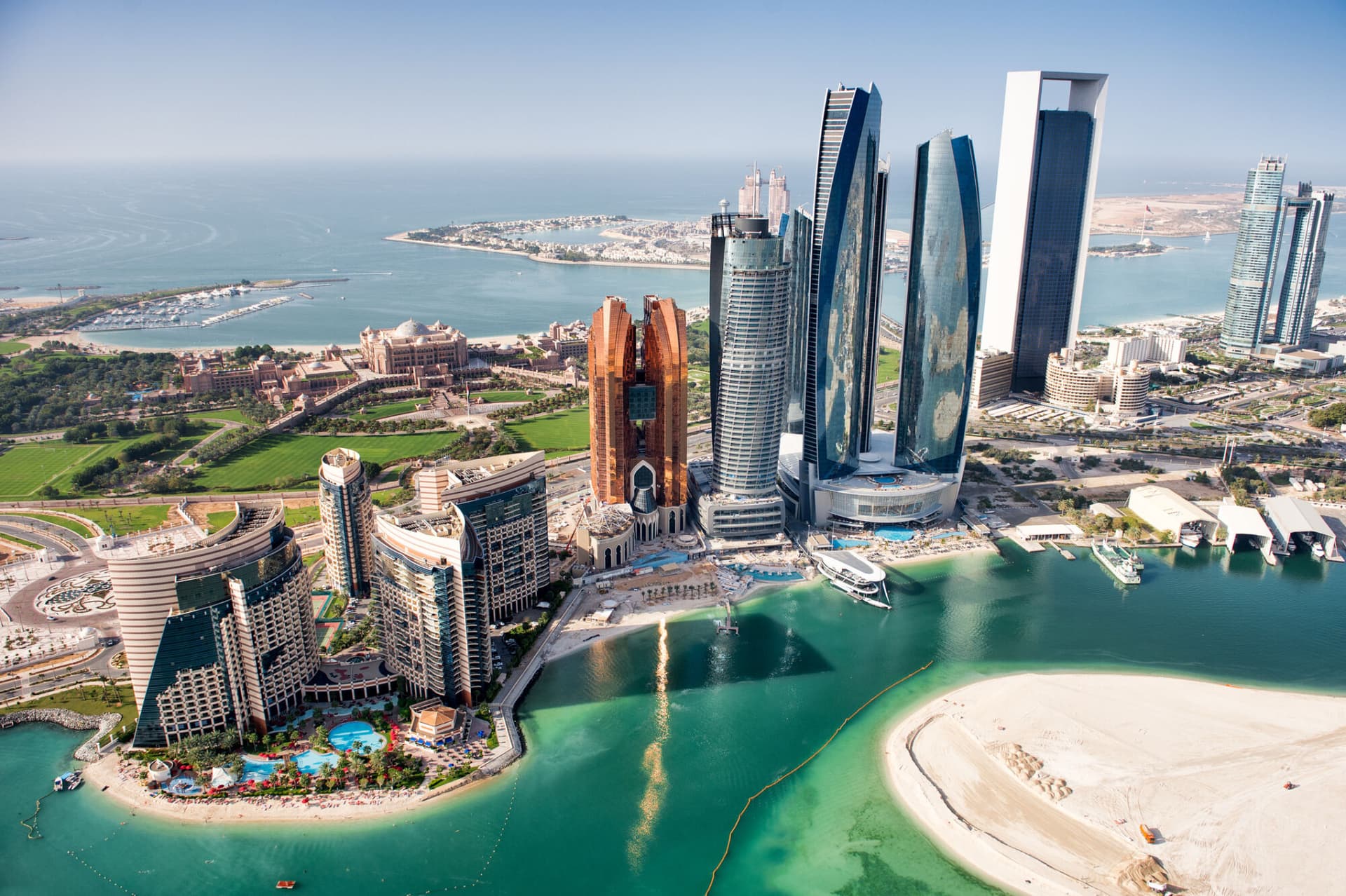 Image of the Abu Dhabi skyline during daytime.