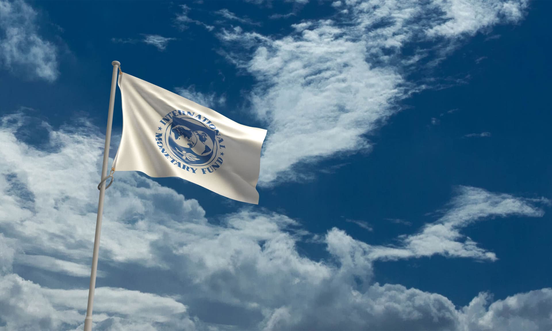 IMF flag against blue sky