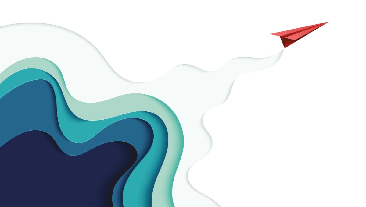 A red paper aeroplane leaves a wavy trail in its wake