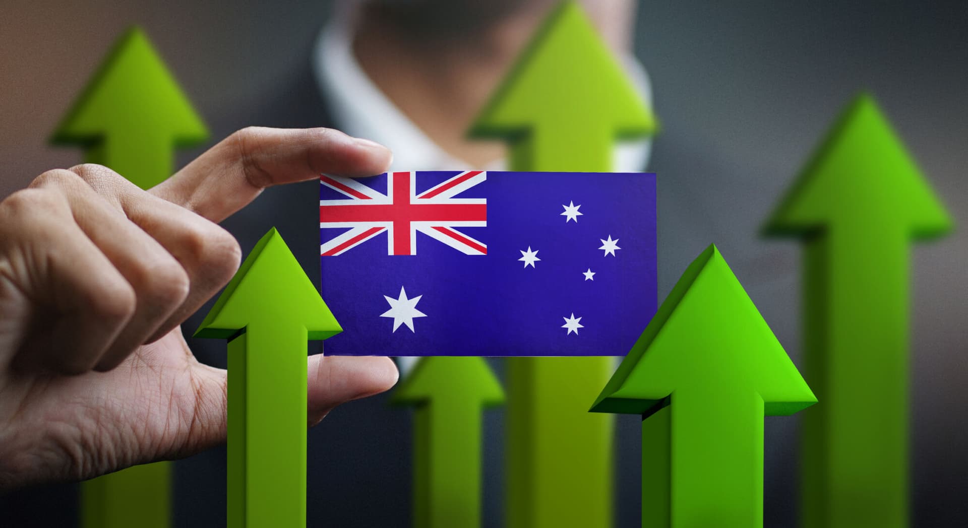 Nation Growth Concept, Green Up Arrows - Businessman Holding Card of Australia Flag