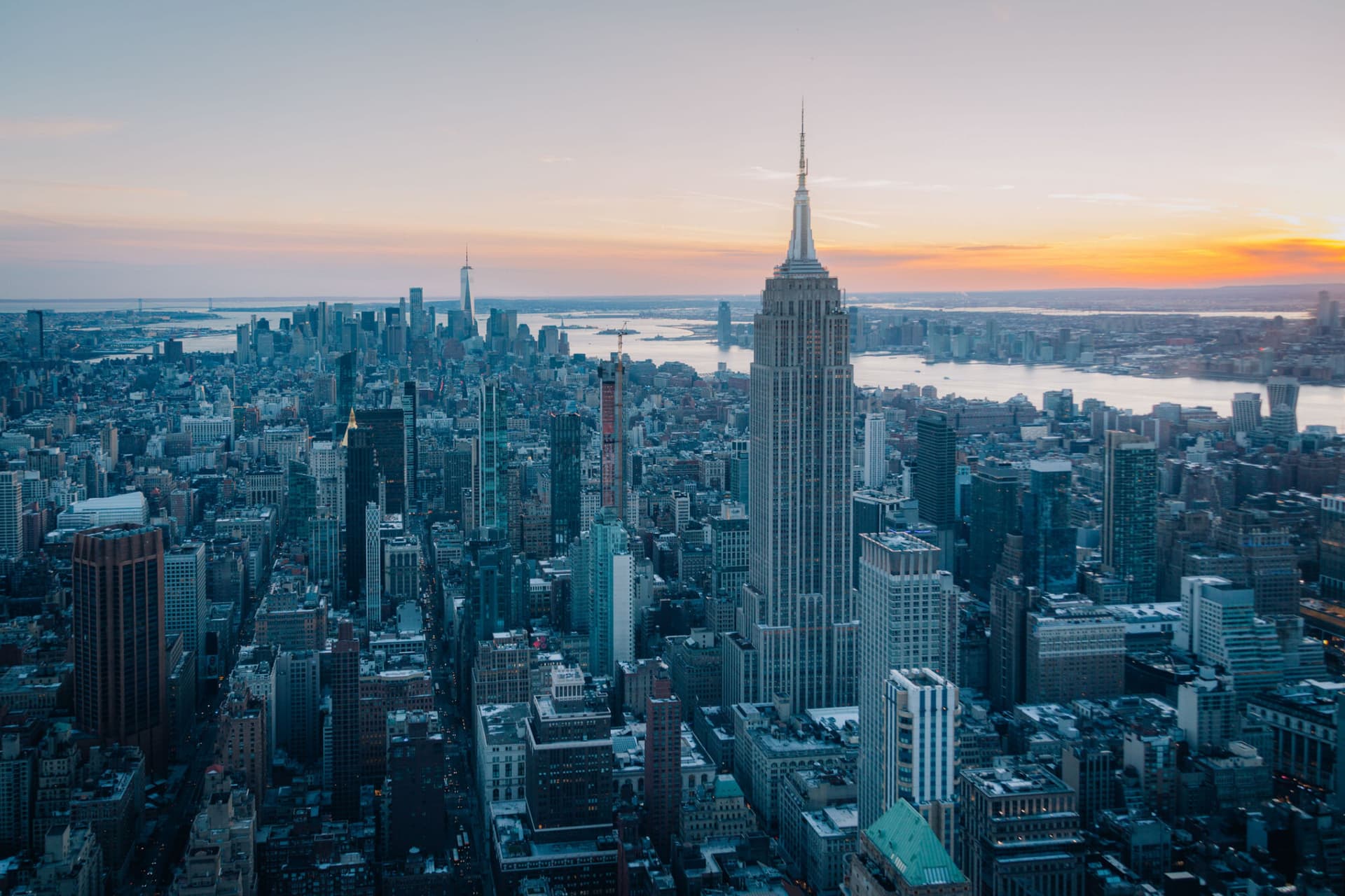 Image of the New York City skyline at sunset.