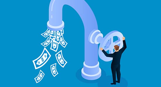 Businessman opens faucet valve to control money outflow
