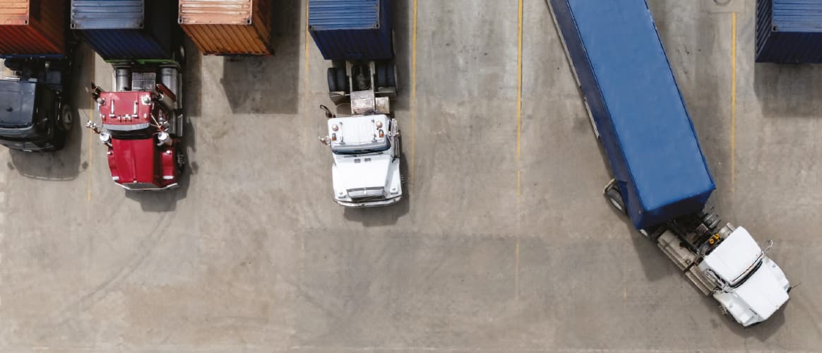 An aerial photo of lorries parked in a car park