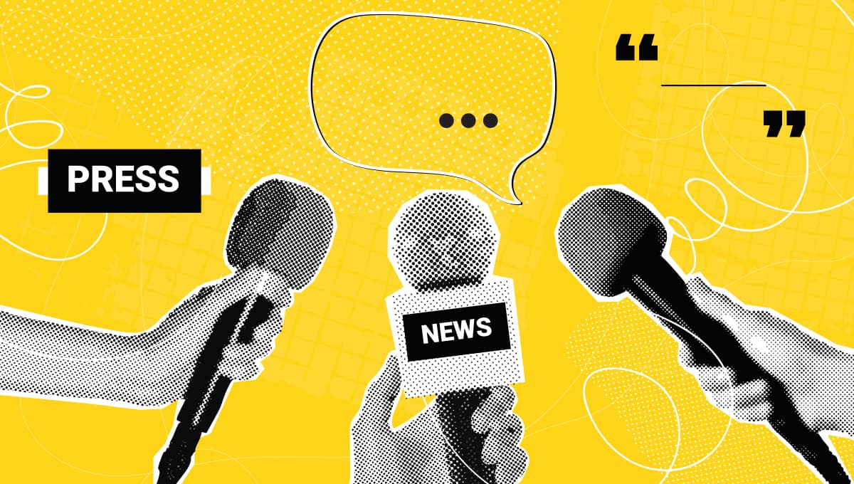 Three hands each hold a microphone